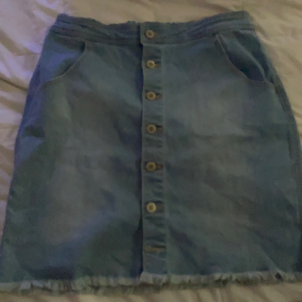 A short denim shirt with buttons (that do work).